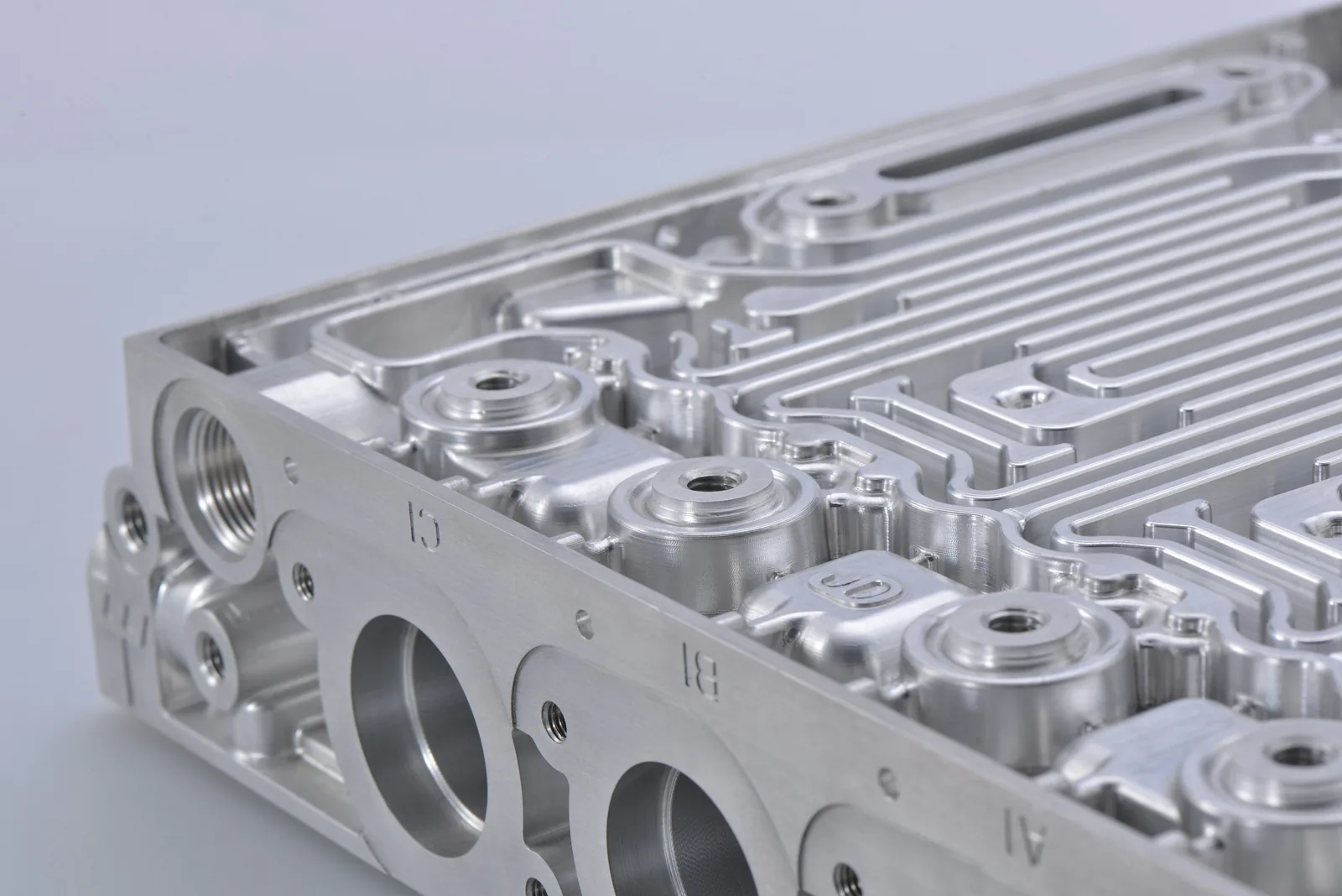A machined aluminium manifold block